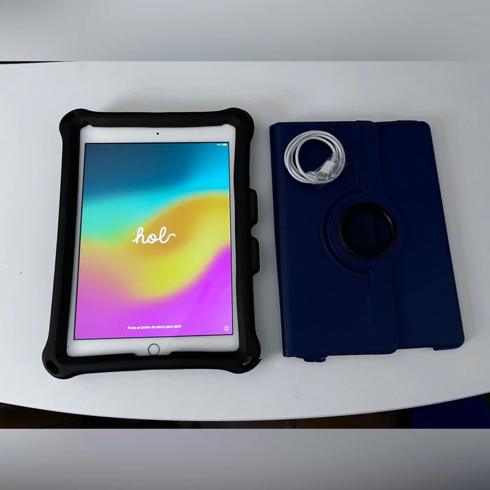 Apple iPad 2 in Champaign with Black Rugged Sleeve and Navy Blue Rotating Folio.